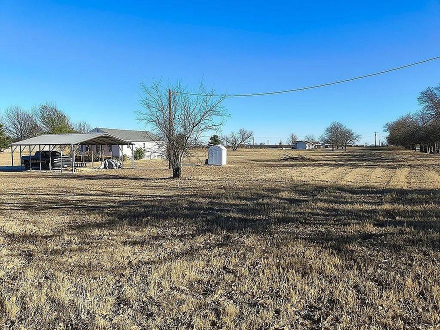 This 5 acre property has 2 houses ( 1250 Winn Rd & 1306 Winn Rd ), 2 water wells and 2 septic systems. One home is a 3 bed 2 bath and the other is a 3 bed 1 bath. Great location and beautiful views. Corner lot. Country living only 4 miles from town and access to Hwy 287.