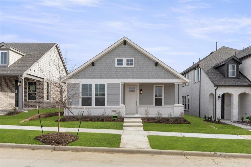 MLS# 20494176 - Built by Ashton Woods Homes - Ready Now! ~ Gorgeous new Ashton Woods home in Northwest ISD within #1 amenity-rich community Pecan Square, just North of Fort Worth in Northlake, Texas, and minutes from IH-35W. This charming Haslet home design features the Rockwall Collection. A large covered front porch and an 8’ front door decorate the exterior of this new home. Luxury wood vinyl flooring extends from
the foyer throughout the entertaining space. Clear sightlines from the kitchen to the family, and dining areas makes entertaining effortless. Two secondary bedrooms, at the front of this new home, share a full bath ceramic tile and a solid surface countertop vanity. The kitchen has several premium finishes including Energy Star Whirlpool stainless steel appliances, 42-inch shaker cabinetry, solid surface quartz countertops,  a spacious eat-in bar top island, pendant lighting, a built-in microwave and oven, dishwasher.