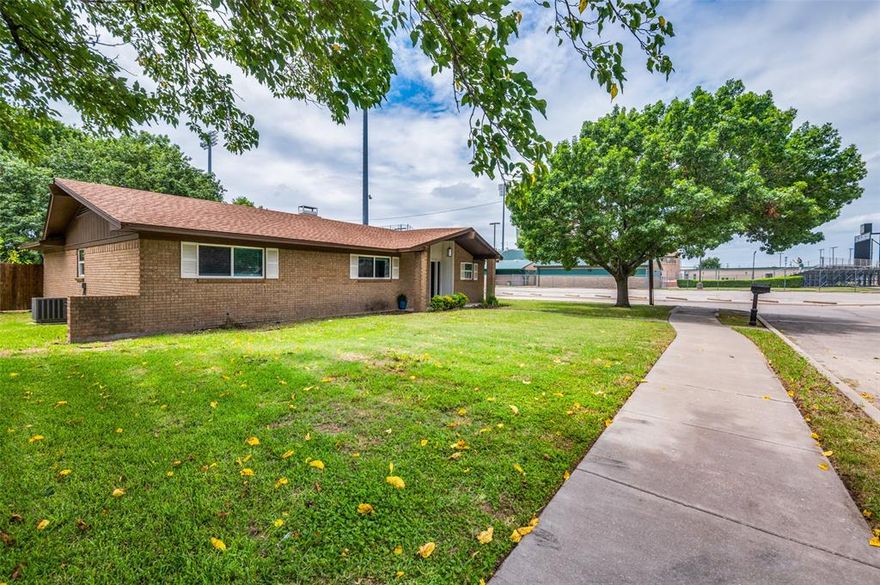 Welcome to your perfect home! Nestled on a desirable corner lot, this charming three-bedroom, two-bathroom residence boasts modern updates and a prime location near shopping. Step inside to find brand new carpet throughout, providing a fresh and cozy atmosphere. The oversized laundry room offers ample space and convenience for your household needs. The large backyard is a standout feature, featuring a spacious patio perfect for outdoor gatherings and a huge, beautiful tree that provides shade and a picturesque setting. Don't miss out on this well-maintained home, offering comfort, style, and convenience!