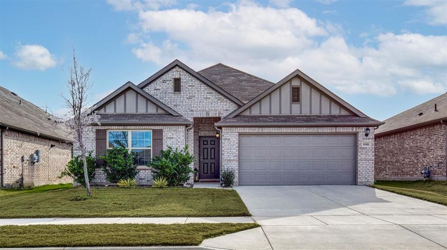 This beautiful home in Fort Worth offers the perfect blend of space, style, and functionality—essentially brand new and truly move-in ready. The inviting single-story layout features four bedrooms, including a luxurious owner’s suite with a deluxe ensuite bath. Low maintenance vinyl plank flooring flows seamlessly through the main living areas, while additional windows in the family room flood the space with natural light and provide views of the covered patio—ideal for indoor-outdoor living. The well-appointed kitchen showcases white-painted cabinetry with generous storage, upgraded stainless steel appliances, and a large granite center island perfect for meal prep, entertaining, or casual dining. Tucked away at the rear of the home, the private owner’s suite is a true retreat, highlighted by an extended bay window, a spacious walk-in closet, and a spa-like ensuite bath complete with a soaking tub and separate shower. Designed to meet today’s lifestyle needs, this nearly new home delivers comfort, elegance, and everyday practicality. Located in the desirable Cooper Creek community, residents enjoy thoughtfully planned amenities including green spaces, walking trails, playgrounds, and an on-site elementary school within walking distance. With easy access to major highways, shopping, dining, and everyday necessities, this home presents an outstanding opportunity to enjoy modern living in a growing Fort Worth neighborhood. Seller offering $5,000 concession towards buyers closing costs.