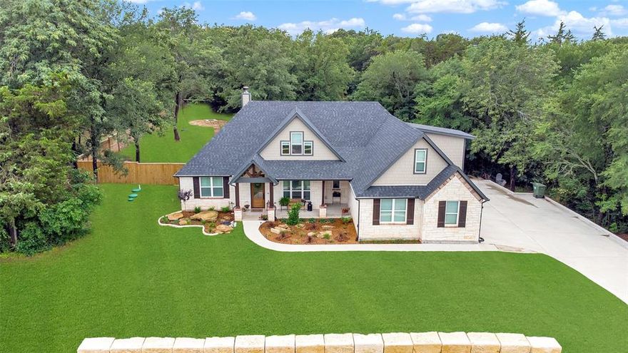 Stunning!!! Incredible location!! Meticulously well-maintained home in the beautiful Tananger Springs neighborhood. Quiet, country setting with large lots, rolling hills, and mature trees. This stately house on a hill sits on one acre with beautiful character, charming finishes, and not to mention the backyard of your dreams! Large living areas, open concept floor plan, bright natural light, and tall vaulted ceilings. Gorgeous custom finishes including tile accents, decorative lighting, granite countertops, and stainless steel appliances. Reading room off the entry could be used as additional office or living space. Second story hosts fourth bedroom suite with quaint landing area - perfect for a reading nook! Glass sliding doors off the main living area lead to your own large covered patio with plenty of space to entertain and enjoy these beautiful summer evenings. Don't miss this opportunity! Call your favorite Realtor and schedule your showing today.