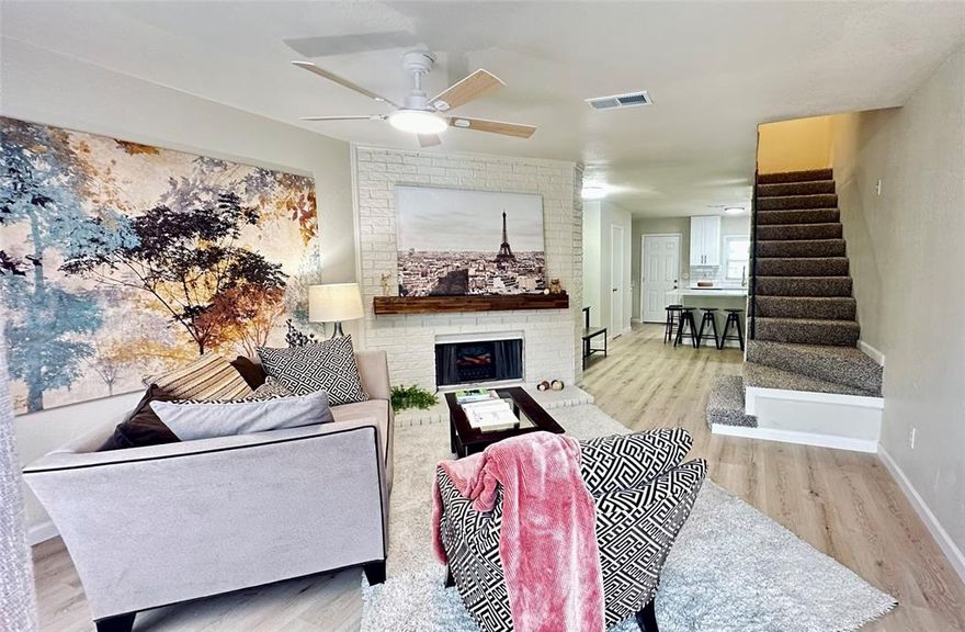 Beautiful, stylish and completely updated townhome for a very affordable price! Brand new stackable washer and dryer included! HOA fees include maintenance of all exterior including future repairs of the roof, siding, mowing, and all exterior maintenance of the property. With so many updates it FEELS BRAND NEW inside: all NEW FLOORING (carpet in bedrooms, waterproof scratch resistant laminate downstairs), all NEW KITCHEN (42in) AND BATHROOM cabinets , NEW tile, faucets, tub and toilets in the bathrooms, quartz countertops and subway style backsplash in the kitchen, removed popcorn and fresh paint on the ceiling, walls, doors, trims, NEW FRONT AND BACK DOORS, NEW BLINDS, most lights and hardware and much more. Bright open concept layout with XL KITCHEN ISLAND perfect for cooking, gatherings, family games and more. Great brick wood burning fireplace. SS appliances. Enjoy your private fenced patio and yard, much larger than neighbors because of the corner lot, backed to the peaceful green belt. Upstairs you'll find two comfortable full of light bedrooms with ample closet and storage space and a shared full bath with direct access from the primary bedroom. Two assigned parking spaces are in front of the unit. Walking distance to elementary school and public transportation, only 0.2 miles from prestigious KIPP Pleasant Grove Charter school for Primary and Middle school students. Charter school enrollment is free, see Private Remarks for more info. Seller will accept FHA offers. This home may qualify for the CRA program, see Private Remarks, also may qualify for the Dallas Neighborhood Homes Program. Please confirm with your loan officer. Home is occupied but can be vacated within a week.