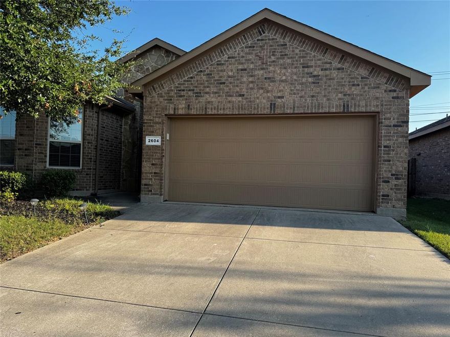 This beautiful spacious 4-bedroom, 2-bath home is ready for you! Step into a grand high-ceiling entrance that opens to a spacious living room with BRAND NEW LAMINATE FLOORING and a cozy fireplace, flowing seamlessly into the dining area and kitchen. The kitchen is equipped with stainless steel appliances, granite counters, and a pantry for extra storage. Three bedrooms and a full bath are conveniently located to the left, while the primary suite features laminate flooring, a walk-in closet, and a private en-suite bathroom. Enjoy evening on the covered back patio-perfect for entertaining and relaxing. Thie home nested within the highly sought-after KELLER ISD. Community pool and other amenities. Don't miss this opportunity-Call me today!