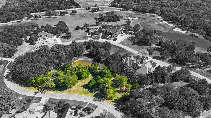 Discover the perfect setting to build your dream home on this .61 acre unimproved lot located within the exclusive, luxury community of Rock Creek Resort on Lake Texoma. Surrounded by serene natural beauty and upscale amenities, such as a top ranked, Jack Nicklaus designed 18 hole golf course, member only clubhouse and restaurant, fitness center, private marina and boat dock, community pool, tennis and pickleball court, and 24 hour security guard within the gates of the community,  this property offers the ideal blend of privacy, elegance, and resort style living. The Roaring Fork Addition of Rock Creek offers some of the most luxurious homes in the neighborhood, sitting atop one of the highest elevations within the community. This specific property offers a unique level of privacy often hard to find in Rock Creek, as it is 3 adjacent lots, adding a buffer lot on either side of a new home.  Rock Creek Resort features privately owned utility access, with electric available at the road. Do not miss this opportunity to build your dream home that comes with luxury, resort style living!