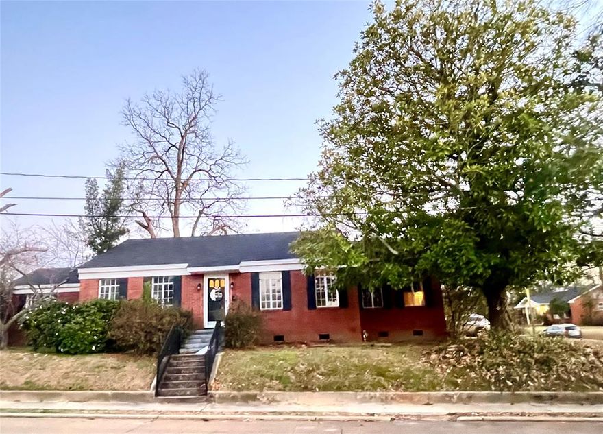 Located on a desirable corner lot, 204 East and West offers charm, character, and spacious living throughout this 3-bedroom, 2-bath home. Step inside to discover high ceilings and the spacious living room which serves as the heart of the home and features a cozy gas log fireplace. The perfect setting for relaxing and entertaining. A formal dining room provides additional gathering space, while the eat-in breakfast nook showcases built-in shelving and natural light, ideal for casual meals or morning coffee. The primary bedroom features cedar lined closets, high ceilings with an adjoining sunroom which provides flexible space that could function as a second living area, office, hobby room, or playroom. Generously sized bedrooms continue the home’s character with hardwood flooring and abundant windows for natural light. Both bathrooms feature tasteful updates and functional layouts. Exterior amenities include a two-car carport, fenced backyard for privacy, and mature landscaping that compliments the established neighborhood setting. With its combination of classic features, versatile living spaces, and convenient corner lot location, this property presents an excellent opportunity for comfortable living just off of Minden's Historical District! This would be a great home for a great flip, great rental or great BnB!! Call today.