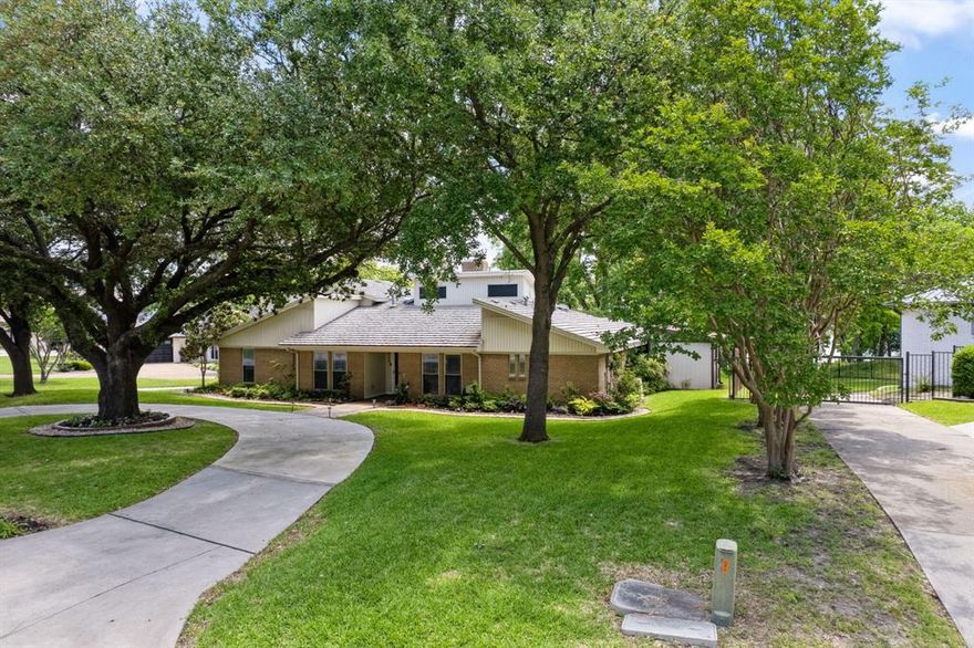 Renovated lakefront home with stunning views and a peaceful, park-like yard. In ROCKWALL ISD and ROCKWALL COUNTY. Great care has been taken to prepare this home for the next owners. This 4bed, 3bath home features an open concept layout with cathedral ceilings, tall fireplace, and updated kitchen and baths with Taj Mahal quartzite countertops. ALL brand-new AC units, updated electrical, new waterproof laminate flooring, and fresh interior exterior paint. The upstairs game room adds flexible living space. Enjoy a new circle driveway, patio, and fencing. A divided shed includes lawn storage and an air-conditioned workshop. Lifetime foundation warranty and Class 4 metal roof offer peace of mind. Fully irrigated. This lakefront retreat blends comfort, quality, and beauty—ready for relaxing or entertaining. Move-in ready and waiting for you!