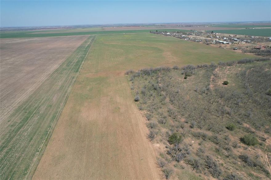 This 127+- acre property, situated in both Jones and Taylor County, offers a unique opportunity for development, residential living, or agricultural use. 
 Conveniently located near Abilene and Merkel, the property has rural water and electricity availability further enhancing its appeal.  The property has frontage on both CR 416 and CR 409 with one parcel within Taylor County and another in Jones County.  Property could be easily split or developed for residential or commercial use. **Buyer to Verify all Schools & Utilities**