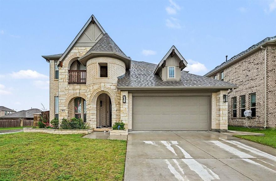 Stunning 2023-built Bloomfield home featuring the popular Wisteria floor plan with 4 bedrooms, 3.5 baths, and over 3,100 sq ft of thoughtfully designed living space. This two-story home showcases a striking stone and brick exterior with a charming second-floor balcony, plus an open-concept layout filled with natural light, elegant arches, and a floor-to-ceiling stone fireplace. The chef’s kitchen is equipped with granite countertops, built-in stainless steel appliances, custom cabinetry, a wood vent hood, and a spacious walk-in pantry—perfect for both everyday living and entertaining. The primary suite is conveniently located downstairs, while upstairs offers an additional suite, large game room overlooking the living area, and generously sized secondary bedrooms. Situated in a desirable community with amenities including pool, park, trails, and clubhouse, this home combines modern luxury with comfort and functionality.