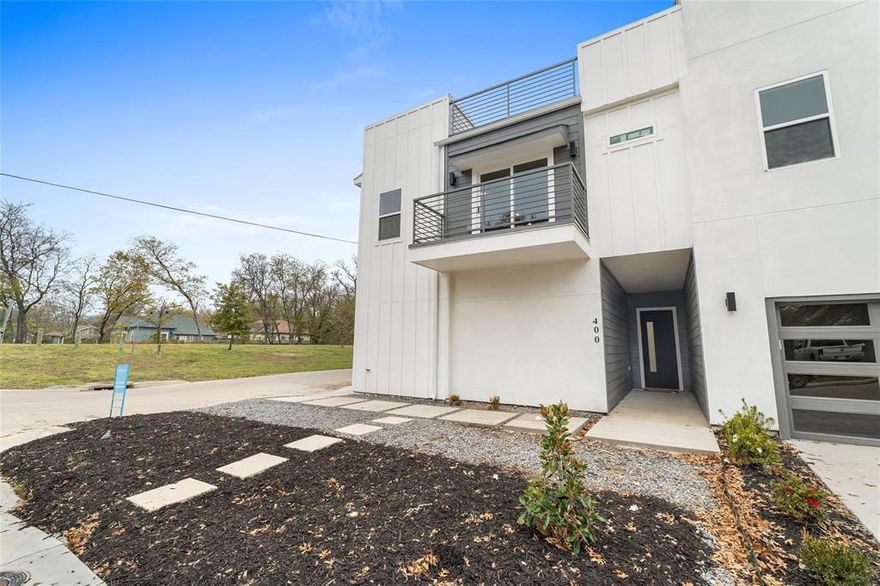 Experience contemporary urban living at its finest in this stunning 2025 new-construction townhome, perfectly situated less than 10 minutes from Downtown Dallas. This three-story modern residence offers an impressive 2,200 sq ft of thoughtfully designed living space, complete with a private rooftop terrace ideal for relaxing, entertaining, or taking in city views.

Step inside to soaring ceilings, an open-concept layout, and sleek architectural lines that blend style and comfort. The gourmet kitchen features modern cabinetry, quartz countertops, premium finishes, and a seamless flow into the light-filled living and dining areas. Perfect for everyday living or hosting guests.

Retreat to the luxurious primary suite, featuring dual his-and-her walk-in closets and a spa-inspired bathroom with designer details. All bedrooms offer generous space and modern finishes to accommodate a variety of lifestyles.

Enjoy multiple outdoor living options, including a main-level private patio and a stunning rooftop deck, creating the perfect backdrop for morning coffee or evening gatherings.

This residence puts you moments from top dining, entertainment, shopping, and major city attractions. A rare opportunity to own a brand-new modern home in an unbeatable location. 

Seller to provide 1-2-10 builder warranty at closing.

Schedule your private tour today and experience the elevated lifestyle that 400 S Henderson Ave has to offer.