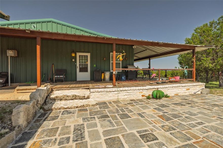 Ready to escape the hustle & bustle? Texas Ranch Retreat with Renovated Barndo, Guest Tiny Home & Endless Views —just under 23 unrestricted acres of peace, privacy, & panoramic views that stretch for miles! Anchoring the property is a beautifully renovated barndominium that blends rustic charm with modern upgrades, featuring granite countertops, new tile backsplash, LVP floors, & newer appliances. The massive walk-in closet & abundance of storage provide room to breathe, & there's even space to easily add a second bath. All-new Pella windows, new vanity & shower, & a spray-foam insulated attic with aluminum pull-down ladder ensure comfort & efficiency year-round. Step outside to a large wooden deck wrapped in Austin limestone—perfect for enjoying the legendary Texas sunsets. New private road & electric gate recently added to provide secure & convenient access from the main road. For those looking for a seamless move, the barndominium is available furnished.
But that’s not all—property also includes:
A fully furnished tiny house with a carport, deck, tankless water heater, PEX lines, washer, dryer, & thermostat-controlled crawlspace vents, perfect for multi-generational living or income producing opportunity!
A detached office with power & AC for work or creative projects.
A workshop with power, storage barn, two carports, & a loafing shed.
A private gun range with berm for safe shooting.
2 wells, 1 dedicated to keeping the stock tank full—home to bass & bluegill.
This ranch has everything you need to live, work, and play—surrounded by open skies, rolling terrain, & the kind of stillness only found out here in the country. Whether you're looking for a full-time residence, weekend escape, or the perfect spot to build your dream legacy, this property delivers.
Ready to catch those sunsets in person?
**Tiny house is 14' x32'=448 sq ft. Office is 12'x16'=192 sq ft. Lg storage barn*workshop (with power) is 12'x16'=240 sq ft. Sm storage barn is 10'x16'=160 sq ft.