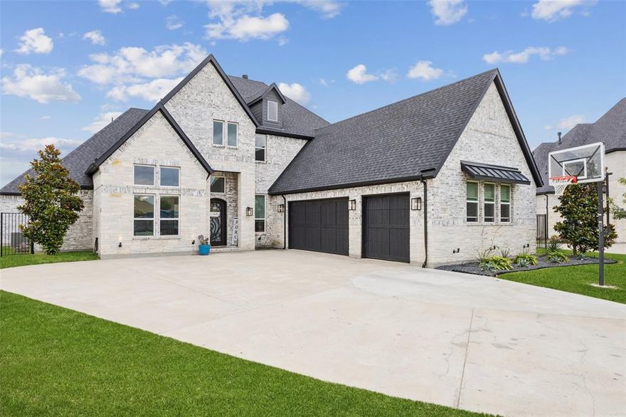 *Motivated sellers* Tucked away at the end of a quiet cul-de-sac in one of Gunter’s most desirable neighborhoods, this elegant home offers a perfect blend of luxury, comfort, and warmth—just steps away from the brand-new Gunter Elementary School. From the moment you enter the grand foyer, you're welcomed by timeless design and thoughtful details. The foyer is flanked by a formal dining room and an elegant home office that can also serve as a 5th bedroom.  The spacious downstairs primary suite is a true retreat, featuring a peaceful sitting area, spa-like ensuite bath with dual sinks, a stand-alone soaking tub, extra large shower, and a generous walk-in closet. Located downstairs is a secondary en-suite, perfect for guests or multi-generational living. With 4 bedrooms and 5 bathrooms this home has space for everyone.  The generous upstairs living space has a loft game room with a built in study area, a private media room and a jack and jill bathroom made for a family. Smart storage solutions abound, including three attics, one of which is walk-in, offering incredible versatility and room to grow. The extended driveway adds functionality and fun, complete with a basketball goal for active afternoons at home. You will appreciate the private outdoor oasis—an extended patio and spacious outdoor living area, ideal for gatherings, grilling, or quiet evenings in the hot tub. The fenced backyard offers open views of the tranquil field behind the home, creating a rare sense of peace and space. A well-placed storage shed keeps things organized while maintaining the clean, expansive feel of the yard. This home has been lovingly cared for, offering beauty, security, and a true sense of community. Furnishings and decor are negotiable. 3D tour available online!