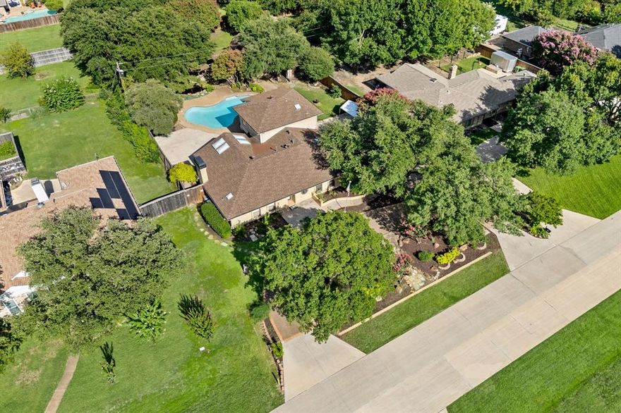 Private One and a Half Story Oasis on Half an Acre – Endless Possibilities Await! Welcome to your own private retreat tucked away in the heart of the city. Freshly painted and full of character, this home sits on a sprawling half-acre lot with unmatched privacy and serenity. Inside, you’ll find timeless details, generous living areas, custom built-ins, and an abundance of natural light. This home blends classic charm with modern updates, making it move-in ready while still offering room to make it your own. Enjoy built-ins in your living room with a gas starter fireplace. The open kitchen, dining room, and sunroom offer multiple spaces to use according to your lifestyle needs. Tucked away, you’ll find a game-room offering views of the gorgeous backyard. The office features built-ins, this room can be used for an in-home office, gym, or media room. Two primary suite options! The backyard is a true showstopper — featuring a completely redone pool, multiple shady seating areas, and a tranquil koi pond with fish that have been cared for over decades. Mature trees, lush landscaping, and a detached storage building offer both beauty and functionality. Whether you’re dreaming of a garden, guest house, workshop, or simply more space to relax and entertain, the possibilities here are truly endless. Whether you’re relaxing outdoors or hosting indoors, this home offers space, privacy, and a tranquil lifestyle just minutes from city amenities. Schedule your tour today!