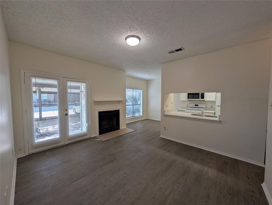Beautiful updated first floor condo near Northpark Mall!  Nice and open living room with private patio.  Dining area just off kitchen. Quartz counters in kitchen and bathroom.  New appliances in kitchen!  LVP throughout.  Bedroom features walk in closet and back patio.  Large bathroom with tub shower combo.  Stack washer and dryer in hallway.