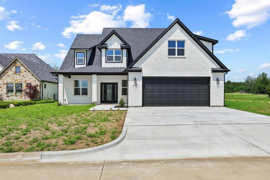 Step inside this stunning home in the gated community of Tanglewood Crossing, perfectly positioned along the course with wide-open views and a peaceful setting that’s hard to beat. Inside, soaring ceilings and a statement fireplace create a striking focal point in the main living area, blending warmth with elevated design. The kitchen is both functional and inviting, featuring stainless steel appliances and a generously sized pantry for added storage and prep space. The primary suite offers a true retreat with a spa-inspired bathroom complete with a freestanding soaking tub, walk-in shower, dual sinks, and spacious walk-in closets. Downstairs, you’ll find two bedrooms—one ideal as a home office if desired. Upstairs, a versatile media or game room provides endless possibilities and could easily serve as a second primary suite, featuring its own bathroom, closet, and a dedicated office nook. Step outside to expansive views, a large custom covered patio, perfect for relaxing or entertaining while enjoying beautiful sunset views. This home seamlessly combines comfort, style, and flexibility in one of the area’s most sought-after communities.