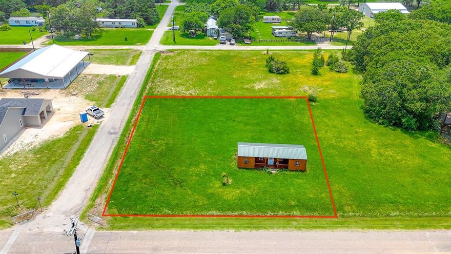 Mobile home and RV friendly lot in friendly lakeside community on Richland Chambers Lake. This corner lot is ideal for your weekend retreat or investment property. Also included with the lot is a wooden structure that can be made into a cozy cabin ideal for weekend escapes, rental income or a base while you build your dream home. Southern Oaks has a fantastic boat dock for community use giving you easy access to the water for fishing, boating and lakeside fun. Cool off in the pool located at the clubhouse. Known for their July 4th parade and community involvement, Southern Oaks is a great community on the south side of Richland Chambers Lake. Come check out this location and make it yours.