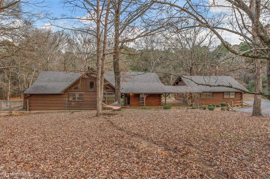 Peaceful Country Living on 10 Acres – Just Outside Minden!
A quiet retreat offering space, privacy, and versatility—perfect for those seeking a true country lifestyle with modern comforts. Built in 1985, the main home features 3 bedrooms and 2 bathrooms with a warm, inviting feel throughout.  Step inside to a cozy main living area with a fireplace, ideal for relaxing evenings, and enjoy an updated kitchen and master bathroom designed with both style and function in mind. The home includes a gas stove, a whole-house carbon tank water filtration system, and a roof approximately 6–10 years old. Outside, you’ll find a fenced yard perfect for pets and room to roam across 10 beautiful acres. Has a 30x40 shop (built in 2002)—great for storage, hobbies, or a home business—along with a 2-car carport, also built in 2002.  

Guest House Bonus!
Built in 2005, the charming log-sided guest house offers 1 bedroom plus a loft, 1 bathroom, a living room, dining area, and gas stove. Washer and Dryer included. It also features a brand-new roof installed December 2025, making it ideal for guests, extended family, or potential rental use. The guest house can be rented out as an Airbnb for around $1400 a month furnished or $140 a night.