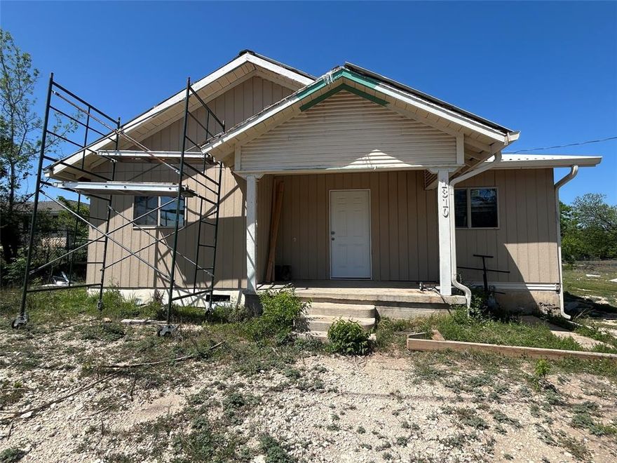 Here is a great opportunity to purchase a fixer upper! The Seller has taken this 1930's home to the studs as shown in the pictures. The home is framed for 2 bedrooms and 2 baths. New exterior metal doors have been installed as well as some of the plumbing. You can finish the interior your way. Seller has purchased some building materials that may convey with the sale of the home. A majority of the exterior has new siding.