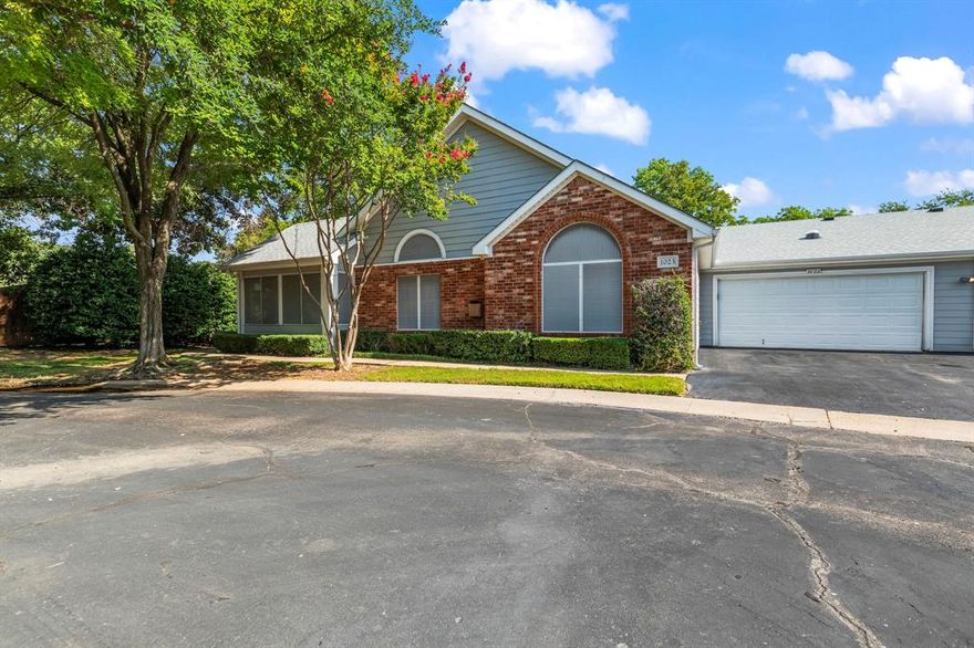 Rare 3-2-2 condo in a GATED private village in Arlington! Originally built as the community’s flagship model home, showcasing premium design and layout. This light-filled, open floor plan feels like a single-family home with vaulted ceilings, a cozy gas fireplace, and a heated & cooled sunroom for year-round enjoyment. Thoughtful features include a Murphy bed with built-ins, custom laundry cabinetry, and ample garage storage. Enjoy low-maintenance living with HOA-covered services and resort-style amenities. The HOA fee includes water, sewer, trash, basic cable, exterior and structural maintenance, landscaping, greenbelt and pond upkeep, and professional management. Residents also have full access to community amenities, including a swimming pool, clubhouse, fitness room, and gated entry for added security and privacy. The HOA also provides the master insurance policy for the building, so the homeowner only needs insurance for personal belongings and interior contents. Low-maintenance living at its best and just minutes from the Ballpark, Stadium, shopping, and dining.