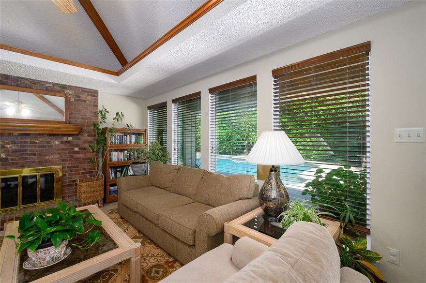 Tucked away in a quiet cul-de-sac and surrounded by mature trees, this beautifully maintained one-owner home offers comfort, space, and timeless charm. Featuring three spacious bedrooms, two full bathrooms, and a convenient half bath, this home is designed for both everyday living and effortless entertaining. Inside, you'll find two inviting living areas and two dining spaces, perfect for hosting family gatherings or enjoying quiet evenings at home. A dual gas fireplace adds warmth and ambiance, seamlessly connecting both living rooms and creating a cozy focal point.
The kitchen flows naturally into the living and dining areas, offering functionality and space, while large windows bring in plenty of natural light. Step outside to your own backyard retreat—complete with a sparkling pool, vibrant landscaping, and plenty of room to relax or entertain.
From the mature trees that frame the property to the loving care it has received from its original owner, this home is truly a rare find. With easy access to Bonnie Wenk Park, Historic Downtown, Hwy 75, Trader Joe's, & Costco - this is an opportunity you do not want to miss!