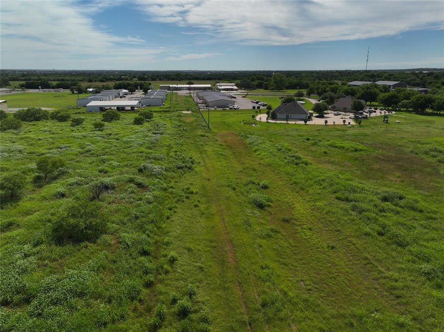 EXCEPTIONAL OPPORTUNITY - 33+ acres with CITY WATER AND SEWER ON THE PROPERTY and easy access off of Highway 51 (Weatherford Hwy) Currently zoned Interim Hold, would make an exceptional location for a mid range priced housing development, with an elementary school just minutes from this location. Comprehensive Land Use Plan for City of Granbury proposed use is low density residential. Downtown Granbury is less than 5 minutes away for shopping, dining and entertainment venues. and it's an easy commute to Weatherford. Property can be divided into one 24 acre tract and one 9 acre tract.  Contact LO for details.
