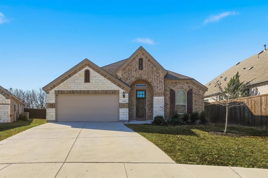 The inviting brick and stone exterior sets the tone for this well-maintained, single-owner 2021 home in Keller ISD. Step inside to a light-filled, open-concept layout where the living room, kitchen, and dining areas connect seamlessly—ideal for everyday living and entertaining. A gas fireplace and decorative lighting add warmth and character to the main living space. The kitchen anchors the home with a gas range and an island with seating, offering plenty of room for casual meals and gathering. A formal dining room provides space for hosting, while a front home office near the entry offers a dedicated spot for work or study. The primary suite is positioned at the rear of the home for added privacy and includes an ensuite bath and walk-in closet. Two additional bedrooms provide flexibility for family or guests. Engineered hardwood floors flow throughout the home, and a tankless water heater adds efficiency. A Tesla charger in the garage will convey. Located in a small, sidewalk-lined neighborhood with convenient access to dining and shopping along Hwy 377, this move-in ready home offers comfort, function, and location in a desirable setting.