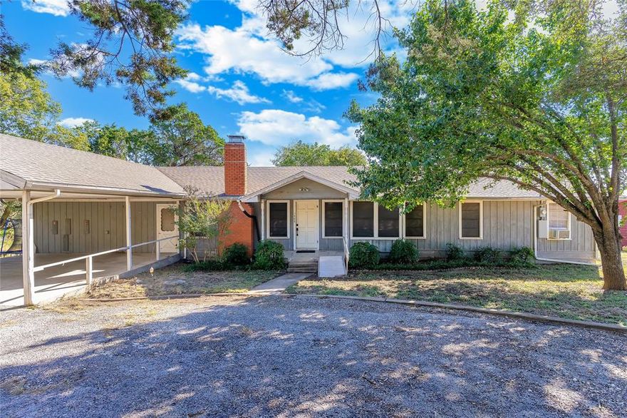 Country home near Lake Whitney • Detached insulated workshop with HVAC • Renovation-friendly financing available

Welcome to 488 County Road 1600 in Clifton, TX. Set on 0.836 acres just minutes from Lake Whitney with community access to a boat dock, this 2,399 sq ft home offers space, flexibility, and rural privacy. The layout includes 4 bedrooms, 2.5 baths, and multiple living areas suited for everyday living or entertaining. Vinyl plank flooring is installed throughout much of the home. Stair flooring needs repair; replacement flooring has already been purchased and will convey with the property. The kitchen includes a range in good working condition plus a new oven, dishwasher, and microwave that convey. Updated door hardware also conveys. A 14x40 detached building is fully insulated and drywalled with electric service and two mini-split units providing heating and cooling—ideal for a workshop, home office, gym, or guest use. Large yard with mature trees and room for future projects. VA, FHA, and USDA renovation loan options available—eligible buyers may finance renovation costs into the loan. Special financing available—ask for details.