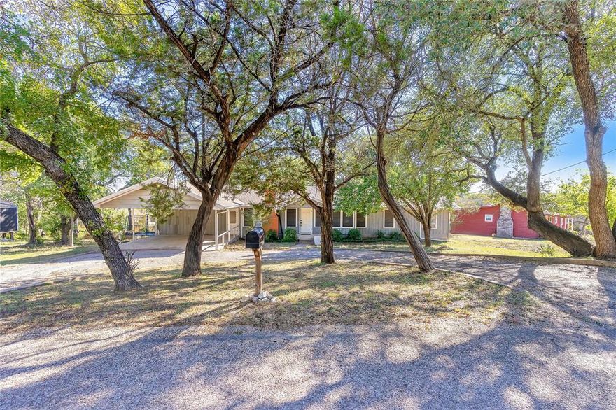 Lake Whitney access • 0.83-acre lot • 4 bedrooms + workshop

Set on approximately 0.836 acres just minutes from Lake Whitney, this 4-bedroom, 2.5-bath home offers space, flexibility, and a quiet country setting. The 2,399 sq ft layout includes multiple living areas suitable for everyday living or gatherings. Vinyl plank flooring runs through much of the home, providing durability and easy maintenance.

The property includes a detached, insulated workshop with HVAC—ideal for hobbies, storage, or workspace needs. Community access to a boat dock offers convenient entry to Lake Whitney for boating and outdoor recreation.

Spacious lot provides room to spread out, garden, or enjoy the outdoors. Replacement flooring for stairs has already been purchased and will convey with the home.

Located within Meridian ISD and with access to nearby highways, this property combines rural setting with proximity to lake amenities and surrounding towns.