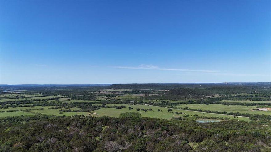 Nestled in the heart of the Palo Pinto Mountains, this property has been in the same family over 40 years. This beautiful property is a portion of a larger, contiguous tract. The property has an approximate 270' elevation change with breathtaking views, 5 ponds, FM road frontage, approximately 20 acre cultivated food plot field. The property has been awarded two state of Texas wildlife conservation awards, and the seller is willing to consider conveying the minerals.  Come explore the miles of roads and view the numerous scenic outlooks and abundant wildlife. Moments from three state parks, Lake Possum Kingdom, Lake Palo Pinto, there is always something enjoyable to explore. Seller is a licensed Texas real estate broker.