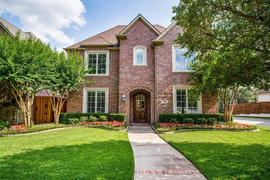 Traditional University Park home on corner lot offers over 4400 square feet of beautifully designed living space. The Center Hall Floor Plan welcomes you to split Formals, Office with built-ins and glass French doors, chef's island Kitchen with top of the line appliances opens to Den and features a walk-in pantry, breakfast bar as well as the adjacent Breakfast Room. The spacious Den features  built-ins on each side of the fireplace and a wall of windows overlooking Pool and Covered Outdoor Patio. This home offers beautiful hardwood floors, plantation shutters, open floor plan and attention to detail. Upstairs Primary Suite is a true retreat showcasing a beautiful ceiling, wall of windows with plantation shutters. separate vanities, luxurious  tub,  separate shower and a large walk-in closet. Upstairs two secondary bedrooms connected with Jack and Jill Bathroom, additional secondary Bedroom with en-suite Bath, plus a large versatile Living area with Bath. The private backyard with sparkling pool and gated drive offer year-round enjoyment. This home is close to premier shopping and restaurants, SMU cultural and sporting events, Snider Plaza and several neighborhood parks.