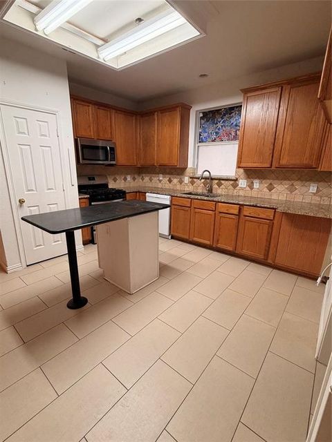 Photo of 2101 Meredith Lane, Garland, TX 75042 (MLS # 21229780)