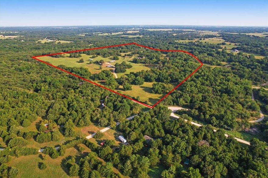 Over 92 Acres of Scenic Texas Land with Sandy Loam Soil only 5 minutes from highway 82, 1000 feet of road frontage, mobile home on site to live in while you build your new home! Witness the beauty and potential of this 92+acre property, offering a perfect blend of natural features and agricultural advantages. The land is cross-fenced, ideal for livestock or other agricultural uses, and boasts over 100 thriving pecan trees. The property is Ag exempt, enhancing its appeal for agricultural endeavors. Among the mature oak trees—some older than the state of Texas itself—you'll find a serene landscape of rolling hills and four picturesque ponds. Sandy creek meanders along the northern boundary, adding to the property's appeal. Several barns and shops, provide ample space for equipment, storage, and potential projects. A Rare opportunity to own a piece of land without restrictions, where natural beauty meets functional utility. Call ahead to book tour around the property with a side by side!