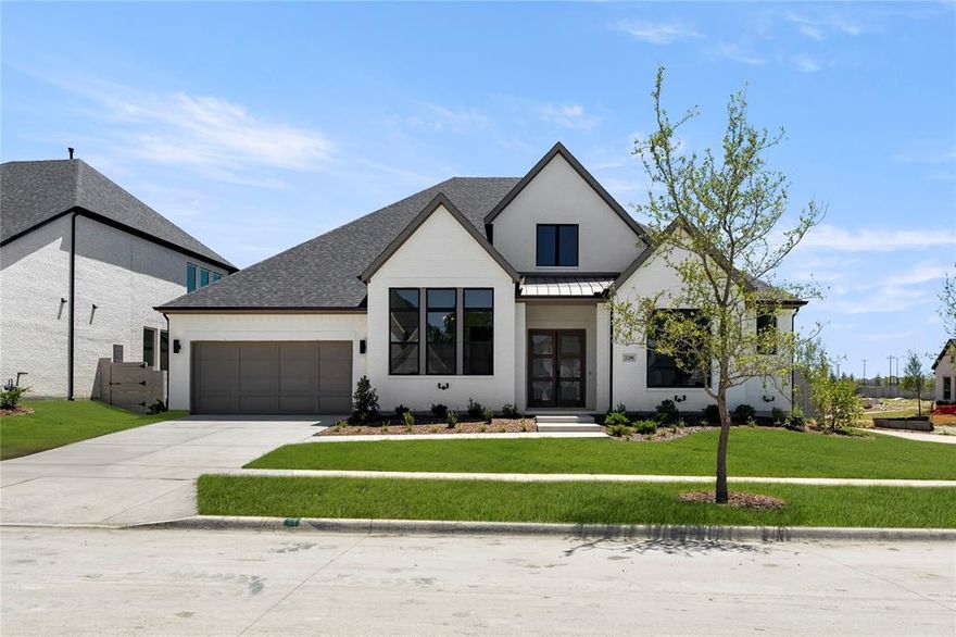 MLS# 20835584 - Built by Drees Custom Homes - Ready Now! ~ This plan is Drees best selling one story home with beautiful designer colors throughout. The soaring elevation showcases white painted brick with contrasting black windows and black roof. You will be greeted with double front doors, tons of wood flooring, tall ceilings and giant windows. This is a must see! *The 3D tour in this listing is for illustration purposes only. Options and finishes may differ in the actual home for sale. Any furnishings shown are not a part of the listing unless otherwise stated.*