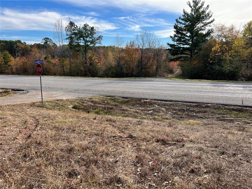 MOTIVATED SELLERS OFFERING OWNER FINANCING - NO HOA - RESIDENTIAL OR COMMERCIAL USE. This 1.7 acre lot features nearly 400 feet of frontage on Highway 64 and just over 250 feet on County Road 4926, this property offers excellent accessibility. This lot is conveniently situated only 15 minutes outside of Tyler, presents an incredible opportunity for you to bring your dream home or business to life - or even both! With no known restrictions and no zoning limitations, this versatile land can be utilized for either residential or commercial purposes. Whether you're seeking an investment property, a location to construct your ideal home or business, or simply a tranquil retreat away from the hustle and bustle of the city, this land has everything you need.