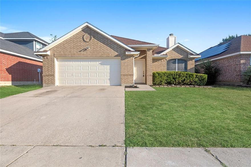 Beautifully updated and move-in ready! This 3-bedroom, 2-bath home is filled with stylish upgrades, including fresh paint, luxury vinyl plank flooring, and a fully updated kitchen and bathrooms with white cabinetry and granite countertops, brand new appliances, and all new lighting and hardware throughout. Offering three versatile living areas. The main living room features a cozy fireplace as its centerpiece, while the kitchen offers abundant cabinet space, granite counters, new appliances, and an inviting eat-in area with a charming window seat. The last living space just off the kitchen provides great options for dining or entertaining.

The primary suite boasts a massive walk-in closet, dual sink vanity, and a large garden tub for relaxing. Two secondary bedrooms are thoughtfully split from the master for privacy. Step outside to enjoy a flagstone patio, mature shade tree, and a privacy fence—an ideal setup for outdoor living. Centrally located with easy access to shopping, dining, and I-35W, this home offers quick commutes to Alliance Motor Speedway or Downtown Fort Worth. A must-see gem!