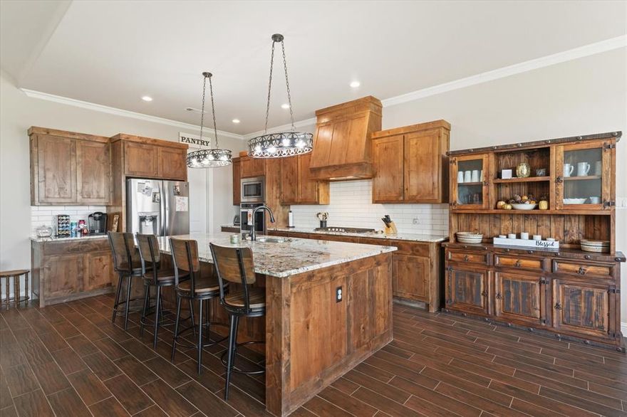 **Assumable loan option with 3.125 interest rate!! Welcome to your new home! This custom build, single owner home, was created in 2021 and has all the space you need.  As you walk in, you have your separate office space with tons of natural light from the front and double glass doors to give that touch of privacy.  Into your living area, you're met with 32' cathedral vaulted ceilings, ceramic tile floors throughout and a cozy gas stone fireplace.  The open concept kitchen with a 12' island is perfect for those football watching parties with plenty of space for snacks and friends to gather during the big game. With a separate dining room next to the kitchen, you can still have space for breakfast with the family before starting the day. The primary bedroom, secluded on one side of the house away from the other 3 bedrooms, is oversized with tons of natural light flooding in through the large windows. Separate vanities in the en suite bathroom and large walk in shower with clawfoot tub, perfect for relaxing after a hard day.  The other 3 bedrooms are a great size with a jack and jill bathroom and half bath for visitors.  The bak patio is perfect for those relaxing Texas evenings while the dog plays in the acre backyard.  Nearby you are close to highway I-20 and just W of the growing area with Bucee's, other shops and restaurants to enjoy.  Come see yourself in this new home and enjoy everything it has to offer!