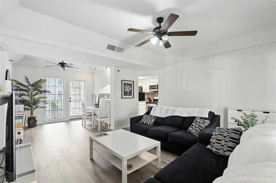 PRICE REDUCED! Stylishly updated condo in the serene Bryan Place community, just minutes from downtown Dallas—an ideal opportunity for first-time buyers or investors. This well-designed home features two spacious bedrooms, 1.5 baths, and two private covered patios perfect for relaxing or entertaining. Highlights include an open floor plan, soaring ceilings, luxury vinyl plank flooring throughout, and abundant natural light. The kitchen boasts light colors, quartz countertops, and stainless steel appliances, while the primary bath offers a modern frameless shower. Located just one block from Exall Park and close to Deep Ellum, Uptown, and Lower Greenville. Appliances convey with the property (kitchen built-ins plus the refrigerator, washer & dryer). 2 assigned spots at the gated parking are included.  HOA covers water, trash, and exterior maintenance, making this property a perfect blend of convenience, comfort, and style.