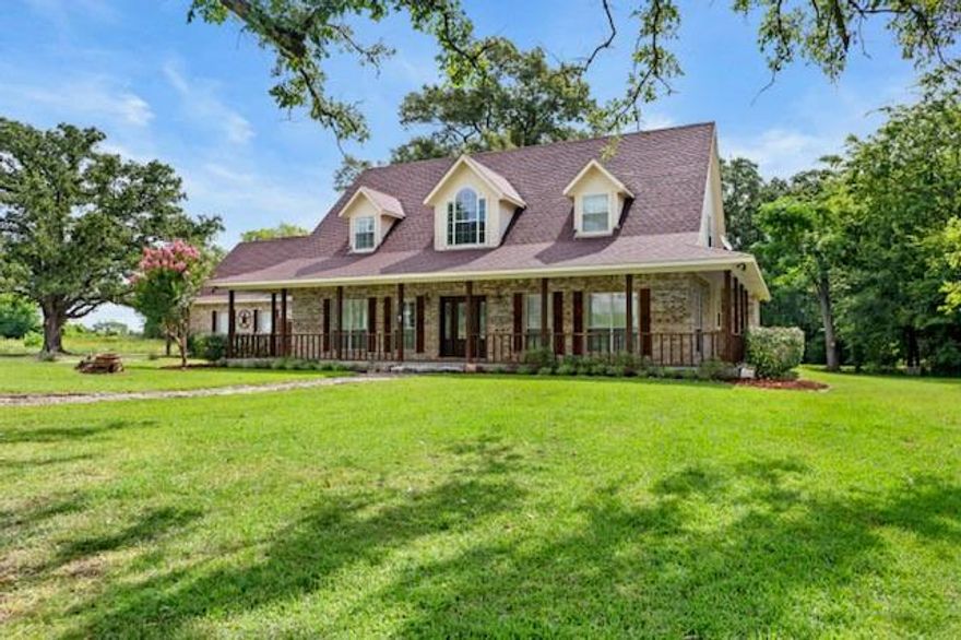 Nestled in the quiet Woodson Place subdivision, this charming 3- bedroom, 2.5-bath home sits on over .5 acres in a peaceful, dead-end neighborhood with only one way in and out — and no HOA. Enjoy the outdoors from the wrap-around porch shaded by mature trees, or relax on the spacious back patio. Inside, the open floor plan features a large kitchen with plenty of storage, built-ins in the living and dining areas, and a convenient built-in desk. The large main-floor primary suite offers enough space for a private sitting area and has a private access to the backyard . Upstairs are two bedrooms with window seats. There is also attic access that offers room to expand if desired or additional storage! Private, peaceful, and full of potential — this East Texas retreat is ready to welcome you home. Schedule your showing today!