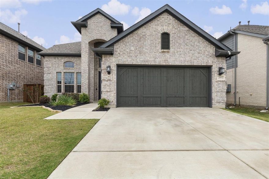 Welcome to 2612 Henley Way, a beautifully crafted 5-bedroom, 3.5-bathroom home, built in 2023, located in the highly desirable Somerset community in Mansfield, TX. This spacious home offers 2,624 square feet of modern living space, providing the perfect blend of style, comfort, and functionality for families of all sizes. The chef-inspired kitchen is a standout feature of the home, complete with ample storage, pull-out trash drawer, and 42-inch cabinetry. It flows seamlessly into the expansive family room, which features a corner gas fireplace, and a contemporary color scheme. A private study on the first floor provides a peaceful space for work or relaxation, while the upstairs game room offers an additional area for entertainment or downtime. Enjoy the outdoor living space with a covered back patio, complete with a gas drop for a future outdoor kitchen. Modern upgrades throughout include premium flooring, art niches, and window blinds. Energy efficiency is a priority, with a tankless water heater. The Somerset community offers an array of amenities designed to enhance the quality of life for its residents. Enjoy lush parks, scenic ponds, and greenbelts, perfect for walking or biking. Amenities include a resort-style pool and clubhouse, providing a space to relax and socialize. The community also features biking trails and pocket parks for outdoor recreation. Conveniently located just off Highways 360 and 287, Somerset provides easy access to major thoroughfares, making commuting and travel a breeze. The home is within the highly rated Mansfield Independent School District, ensuring an excellent education for your children. Nearby shopping, dining, and entertainment options make this the ideal place to call home. Don’t miss out on leasing this exceptional Chesmar-built home in the desirable Somerset community. Schedule a private showing today!