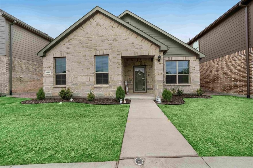 Welcome to 5225 Heritage Street, a beautifully upgraded one-story home in the heart of Haltom City, offering the perfect blend of comfort, style, and modern convenience. This thoughtfully designed 4-bedroom residence features an open-concept layout ideal for both everyday living and entertaining.

Step inside to find a stunning custom-designed accent wall showcasing a newly added fireplace—creating a warm and inviting focal point in the main living area. Natural light flows effortlessly throughout the home, enhanced by solar-panel operated skylights in the hallway and laundry room, adding both charm and functionality.

The kitchen flows effortlessly into the living and dining areas, creating an inviting open layout ideal for entertaining guests or relaxing at home. Designed with convenience in mind, the home features smart technology for enhanced comfort and efficiency, as well as a tankless water heater providing continuous hot water. The spacious primary suite offers two generously sized walk-in closets, delivering exceptional storage and organization.

Additional upgrades include a recently added storm door, enhancing both curb appeal and energy efficiency. With its single-story layout and well-appointed features, this home offers both convenience and style in a growing and desirable area.

Don’t miss the opportunity to make this beautifully upgraded home yours!