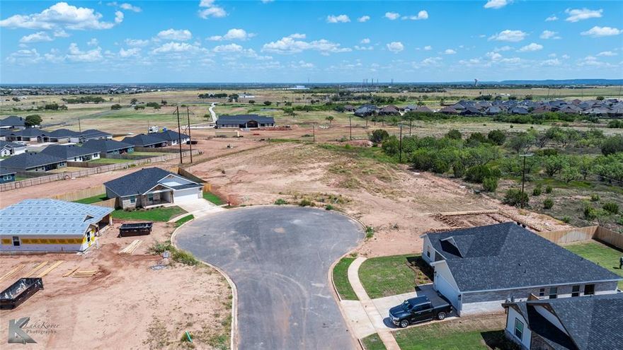 This is the smaller lot next to a home being newly built at the end of the cul-de-sac. Agent sign on the property. Beautiful sunrises and sunsets. Looking for that peacefulness this is your spot to build your low maintenance dream home.