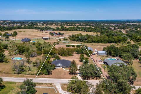 Photo of 321 E Woody Creek Court, Springtown, TX 76082 (MLS # 21354871)