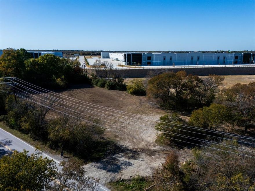 This expansive commercial land is in a prime location. The large newly constructed distribution  and business development center is situated behind this lot. This  strategic site  presents an ideal opportunity for business development and is a canvas for groundbreaking ventures.   This land has already been approved for hotel development with a  popular hotel chain.   Call us today for more information.