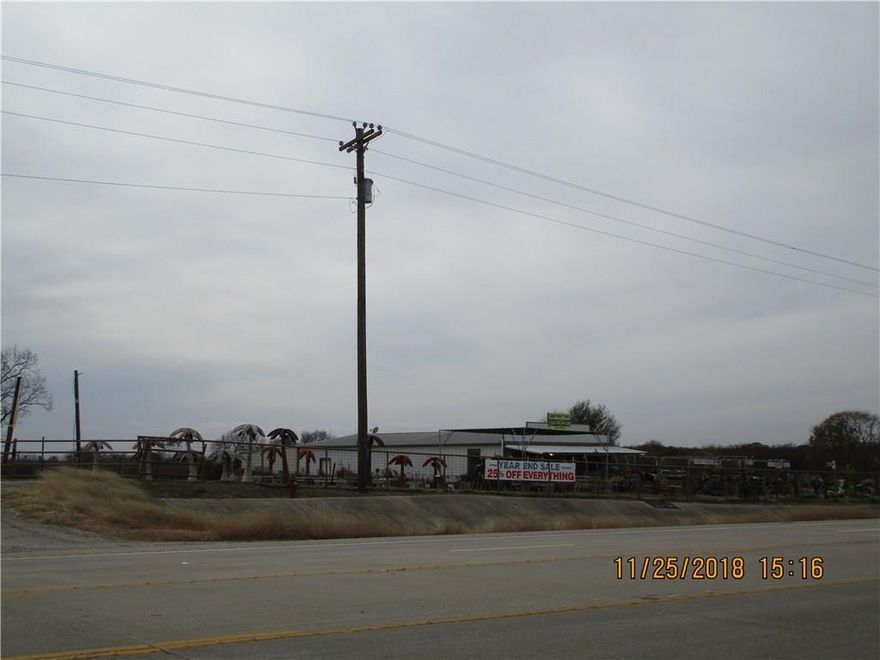 3.54 acres of land suitable for commercial development - now or in the future.  Located in Crossroads - very popular area for new homes which has spurred a great deal of commercial development.  Much more to come.  Buy now to develop now - or hold for the future development opportunities.  Zoned Commercial C-2.  Electric and water available to the site.  Lots of retail nearby - restaurants, Wal-Mart, etc.  May consider sale of less then entire tract.  May entertain lease of tract in whole or in part.  May be willing to co-exist with a user and leave current user intact.  Inquire.