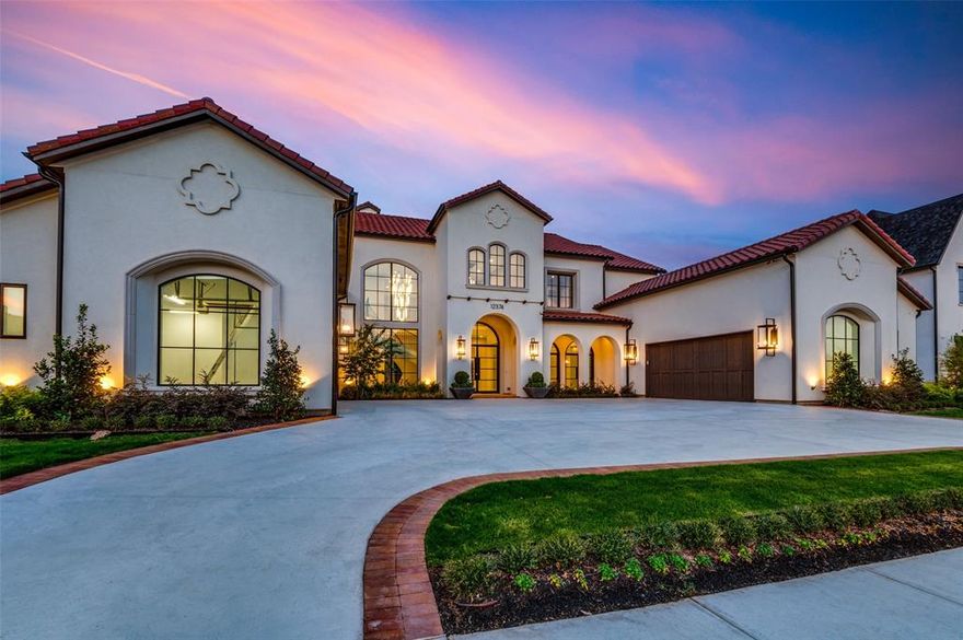 Ron Davis Custom Homes presents this stunning 2 Story Modern Spanish Home clad in Stucco with Modern Spanish Design Elements in an inviting atmosphere situated in one of DFW’s hottest neighborhoods, Newman Village. Located in the exclusive Homestead section, with close access to the Dallas North Tollway on a large lot in Frisco ISD. This home is perfect for families or those who entertain. Enter custom made Iron & Glass Door to experience a new level of elegant, updated luxury that defines a Ron Davis Custom Home. With a Light & Bright, Spanish inspired, Open Concept with a Gourmet Kitchen with Professional appliances, this home is built for entertaining. This home is ready to make a statement to your guests.  This home is complete with a Covered Outdoor Living with full Outdoor Kitchen and Fireplace.1st Floor Study, Junior Master Suite, Laundry, Custom Mud Room, 4 Car Gar, Elegant Finishes, Master Retreat with 2 Closets, Elegant Ceiling Treatments and stunning, bold tiles throughout.