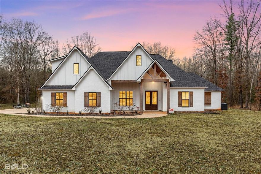 Welcome to this beautifully crafted, one-owner home situated on a sprawling 1.6-acre lot in the coveted Faith Estates subdivision. Offering a perfect blend of luxury and comfort, this custom-built 5-bedroom, 3-bathroom home boasts an open floor plan with thoughtful details throughout.The spacious living room features a striking brick fireplace with gas logs, creating a warm and inviting space for family gatherings. Seamlessly flowing into the kitchen, you'll appreciate the elegant brick accents that continue throughout the main living areas. The kitchen is a true showstopper with gorgeous marble countertops, a large island, walk in butler pantry with shelving space for kitchen appliances, and a convenient pot filler faucet over the stove. The adjacent eat-in dining area is perfect for casual meals or entertaining. The remote master suite is a private retreat, complete with a spa-like en-suite bath featuring a soaking tub, separate tiled shower, double sinks, and granite countertops. The oversized walk-in closet connects directly to the laundry room for ultimate convenience. All bedrooms in this home offer walk-in closets, providing ample storage space.A second master suite is located upstairs, offering its own HVAC unit for added privacy and comfort—ideal for guests or multi-generational living. All bathrooms in the home are equipped with double sinks and granite countertops, further elevating the luxurious feel.Additional highlights include a tankless water heater, a gas starter outdoor fireplace perfect for enjoying evenings outdoors, and a beautiful brick fireplace in the living room. This home is truly a one-of-a-kind gem in a prime location.
Don’t miss the opportunity to own this custom beauty in Faith Estates! Schedule your showing today!