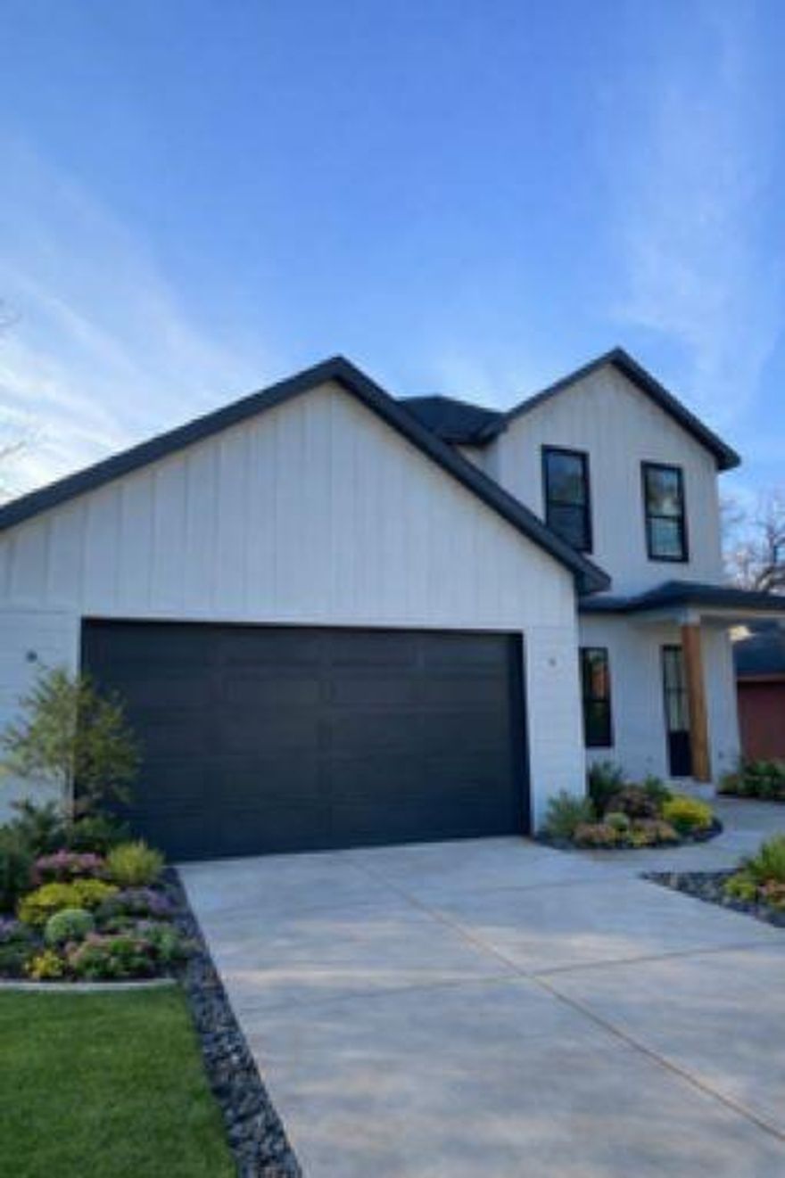 Welcome to this stunning new construction, modern two-story home offering the perfect blend of style, comfort, and affordability—just minutes from downtown. This thoughtfully designed 3-bedroom, 2.5-bath residence features an open-concept layout ideal for both everyday living and entertaining. Step inside to sleek finishes and a spacious living area highlighted by a modern fireplace that creates a warm and inviting atmosphere. The chef’s kitchen showcases quartz countertops, custom cabinetry, and contemporary fixtures, flowing seamlessly into the dining and living spaces. Upstairs, the private primary suite serves as a true retreat, complete with a beautifully designed spa-like bathroom, dual vanities, and elegant finishes. Two additional bedrooms provide flexibility for guests, a home office, or growing needs. With its modern exterior design, energy-efficient features, and prime location close to shopping, dining, and city amenities, this gorgeous home delivers exceptional value and lifestyle. Perfect for homeowners seeking new construction, contemporary design, and convenience—this is urban living at its best.