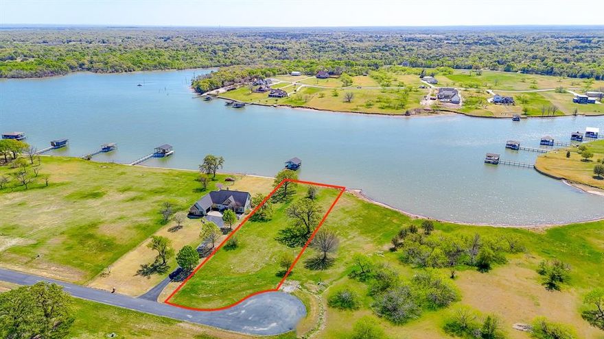 Enjoy beautiful sunsets and cool southern breezes on this 1.031 acre lot located on Richland Chambers Lake. Southpoint is a gated subdivision with a great community pool and boat launch. Deed restricted to site built homes only, with no time limit to build. This lot has several large Oak trees and plenty of room for the home of your dreams.  With just over 100' of water frontage, you can build a fantastic boat dock to house all your water toys! This lot has a new steel retaining wall. You know you want a place on Richland Chambers Lake.  What are you waiting for?