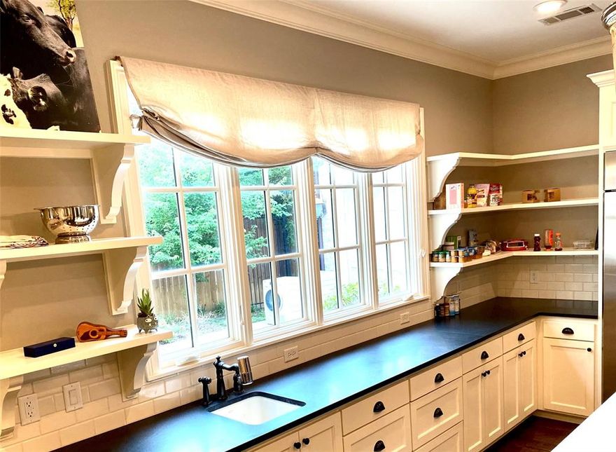 Closed 12 15 2022 with appraisal of $2,495,000. 
AN INCREDIBLY BEAUTIFUL HOME IN ONE OF THE MOST BEAUTIFUL PARTS OF FORT WORTH. AMAZING TREES LINE THE STREETS. PARKS, GOLF, DOWNTOWN, 7TH STREET & CULTURAL DISTRICT WITHIN WALKING DISTANCE. Dickies Arena, Will Rogers Coliseum. NORTHSIDE JUST 12 MINUTES.
TRULY A COMFORTABLE HOME. TWO STORY Modern Classic. GREAT KITCHEN WITH VERY LARGE CUSTOM ISLAND. ENTERTAIN GUEST WITH A WELL THOUGHTOUT FLOW FROM KITCHEN TO DINING, SERVING AREA, 2 LIVING AREAS. THEN OPEN UP TO THE OUT DOOR COURTYARD WITH STONE FIREPLACE. MOST IMPORTANT FOR OWNERS ON THE GO. VERY EASY UP KEEP.  
Stone steps, large front porch and landscaping provide a lot of room to add seasonal colors.
Two story home, entry steps down into LIVING AREAS AND FORMAL DINING. MASTER DOWNSTAIRS. Two separate sets of stairs for second level.