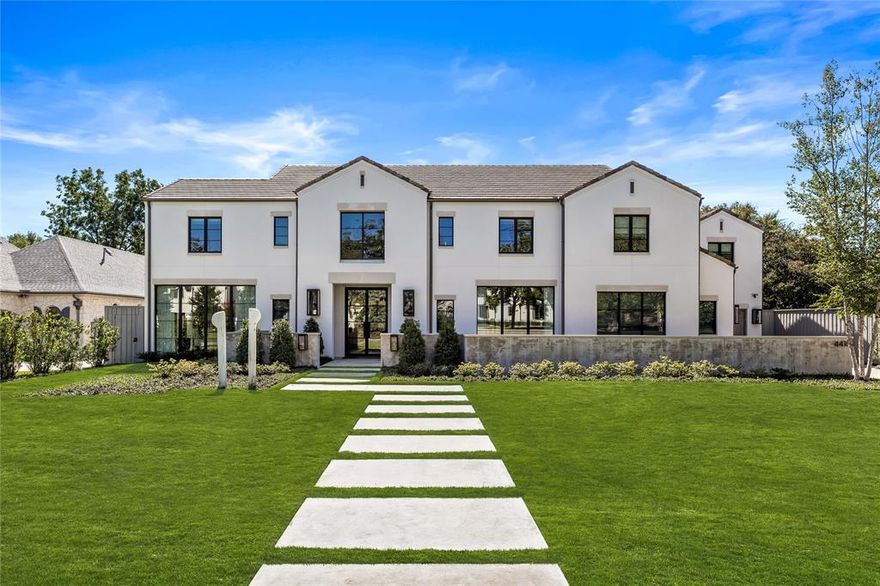 Extraordinary property on .412 acre lot nestled in Preston Hollow, crafted w meticulous attention to detail by Alford Homes in 2020. 1st flr greets you w grand foyer flanked by formal dining feat wine rm & wet bar & sunlit formal living-study w expansive windows & private nook w builtins. Large den w vaulted ceilings, exposed wood beams & gas FP. Open ktchn w high-end applncs, large island w sink, walk-in pantry & coffee bar, adjacent to brkfst rm. Spacious Primary offers cozy sitting area w large windows. Ensuite spa bath w dual vanities, soaking tub, walk-in shower w 4 shower heads & custom closet. Ensuite guest rm on 1st flr, plus media rm, utility, & half bath. 2nd flr feats 3 ensuite bedrms w custom closets. Game rm & fitness rm provide additional areas for relaxation & recreation. The property exudes curb appeal w manicured landscaping, spacious 3-car gar w epoxy flrs, covered patio w phantom screens, gas FP & built-in grill, overlooking pool & spa, turfed yard & putting green.