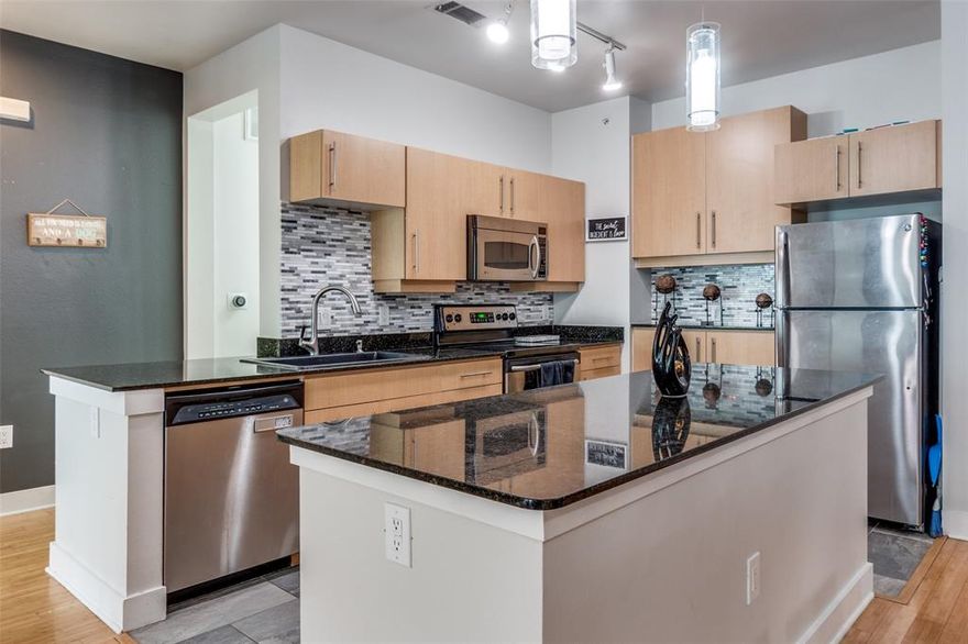 Now even more affordable! ????

Amazing deal per square foot at the Tribeca condominium, at $282 per sqft unit 209 makes for a great value proposition at the Tribeca. Welcome to a stylish mint condition 2-bedroom, 2-bath condo in the heart of Oak Lawn. This spacious 1,291 sq ft residence blends modern comfort with prime urban location. Inside, you’ll find pristine bamboo wood floors, plantation shutters, an open layout, and a gourmet kitchen with a large island, stone countertops, and breakfast bar—ideal for entertaining.

Both bedrooms feature ensuite bathrooms and walk-in closets for privacy and convenience. Enjoy natural light from the sliding glass doors that lead to a private balcony—your own peaceful retreat in the city.

Additional highlights include an attached one-car garage, utility room, and dual private entrances. The community also offers a pool and fitness center for residents.

Located just minutes from Uptown, Love Field, the Katy Trail, and walkable to shops, dining, and nightlife, this condo offers the best of Dallas living with easy access to major highways and public transportation.

Modern. Convenient. Move-in ready. Welcome home.